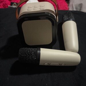 Portable Speaker with Microphones